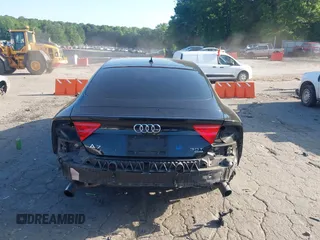 2014 Audi A7 Premium Plus z VIN WAUWGAFC4EN092525, wystawiony jako IAAI lot #42331183 z przebiegiem 183 258 mil mil oraz . Historia ofert i sprzedaży dostępna na DreamBid. Obrazek 16.