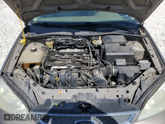 2005 Ford Focus S with VIN 1FAFP34N45W154248, listed as a Copart auction lot 52541945 with 55,062 mi miles and Salvage Title. Bid and sale history available at carsss.com. Image 11.