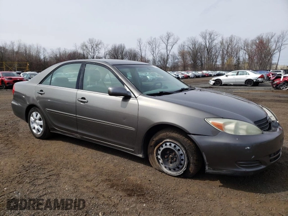 2004 Toyota Camry LE with VIN 4T1BE32K74U886385, listed as a Copart auction lot 51661485 with 175,973 mi miles and Salvage Title. Bid and sale history available at carsss.com. Image 4.