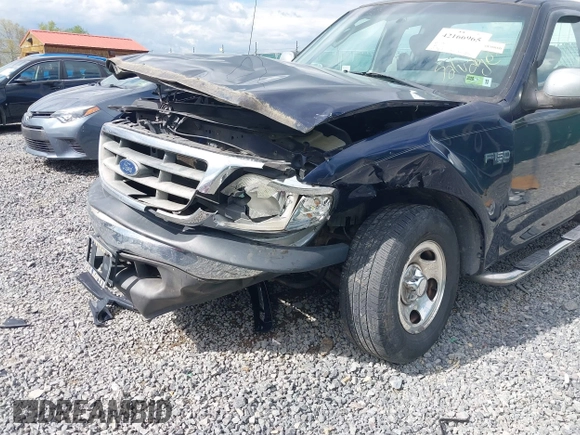 2003 Ford F-150 XL with VIN 1FTRX17223NB22897, listed as a IAAI auction lot 42166965 with 207,627 mi miles and . Bid and sale history available at DreamBid. Image 6.