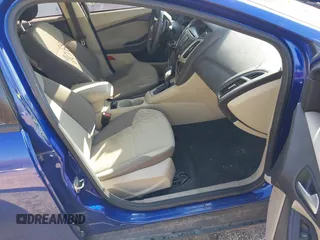 2012 Ford Focus SE z VIN 1FAHP3K28CL297610, wystawiony jako IAAI lot #41999068 z przebiegiem 164 482 mil mil oraz . Historia ofert i sprzedaży dostępna na DreamBid. Obrazek 5.