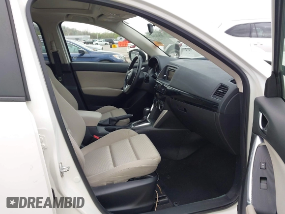 2015 Mazda CX-5 Touring with VIN JM3KE2CY3F0550624, listed as a IAAI auction lot 41931268 with 51,588 mi miles and . Bid and sale history available at carsss.com. Image 5.