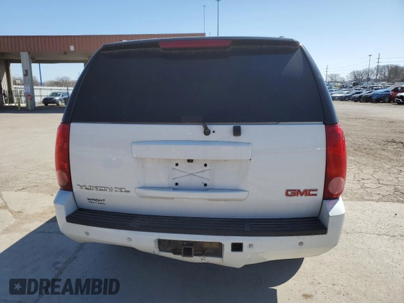 2013 GMC Yukon XL SLT z VIN 1GKS2KE79DR173171, wystawiony jako Copart lot #50618815 z przebiegiem 251 794 mil mil oraz Szkody całkowita. Historia ofert i sprzedaży dostępna na DreamBid. Obrazek 6.