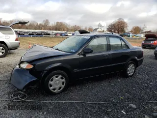 2001 Mazda Protege DX with VIN JM1BJ222510429507, listed as a Copart auction lot 78640074 with 145,735 mi miles and Salvage Title. Bid and sale history available at DreamBid. Image 1.