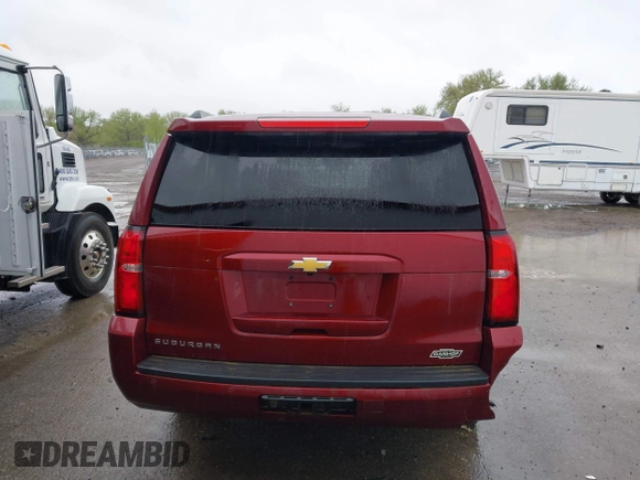 2020 Chevrolet Suburban LT with VIN 1GNSKHKC9LR233603, listed as a IAAI auction lot 41311582 with 104,754 mi miles. Bid and sale history available at carsss.com. Image 16.