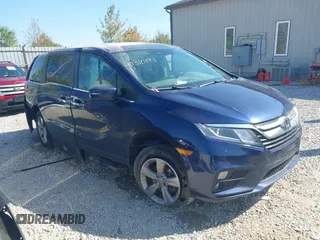 2019 Honda Odyssey EX-L with VIN 5FNRL6H78KB128610, listed as a IAAI auction lot 40310193 with 136,720 mi miles. Bid and sale history available at carsss.com. Image 1.