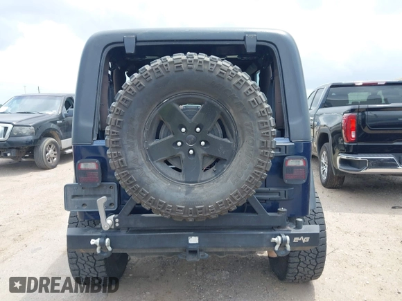 2005 Jeep Wrangler X with VIN 1J4FA39S15P320367, listed as a IAAI auction lot 42114102 with 142,132 mi miles and . Bid and sale history available at DreamBid. Image 16.