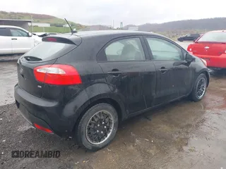2013 Kia Rio LX with VIN KNADM5A35D6224764, listed as a IAAI auction lot 42004548 with 103,582 mi miles. Bid and sale history available at carsss.com. Image 4.