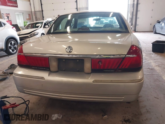 2000 Mercury Grand Marquis LS z VIN 2MEFM75W0YX736324, wystawiony jako IAAI lot #41865927 z przebiegiem 136 886 mil mil oraz . Historia ofert i sprzedaży dostępna na DreamBid. Obrazek 16.
