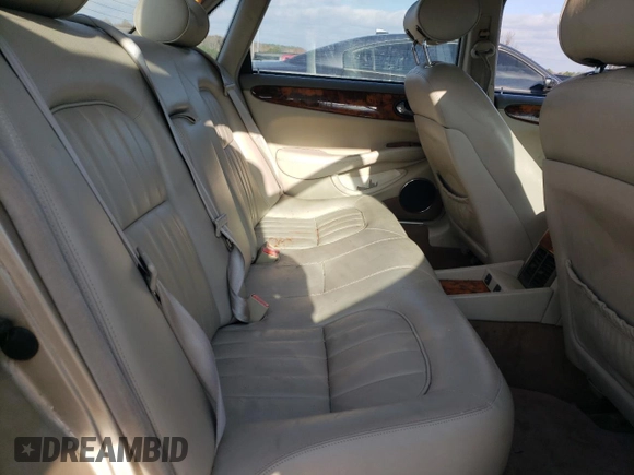 1998 Jaguar XJ with VIN SAJHX1242WC845736, listed as a Copart auction lot 82006044 with 188,785 mi miles and Salvage title. Bid and sale history available at DreamBid. Image 10.