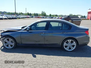 2012 BMW 3 Series 335i with VIN WBA3A9C5XCF077642, listed as a IAAI auction lot 42385611 with 119,251 mi miles and . Bid and sale history available at DreamBid. Image 14.