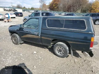 1994 Nissan Frontier with VIN 1N6SD11S4RC405080, listed as a Copart auction lot 82565904 with 154,400 mi miles and Salvage title. Bid and sale history available at DreamBid. Image 2.