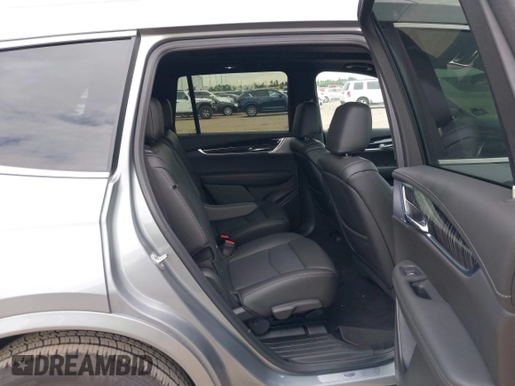 2025 Cadillac XT6 FWD Premium Luxury with VIN 1GYKPCRS0SZ119055, listed as a IAAI auction lot 42574001 with 17,137 mi miles and . Bid and sale history available at DreamBid. Image 8.