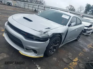 2019 Dodge Charger R/T with VIN 2C3CDXCTXKH757197, listed as a IAAI auction lot 41860544 with 98,820 mi miles and . Bid and sale history available at DreamBid. Image 2.
