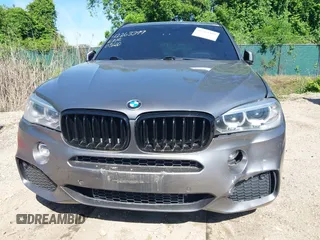 2014 BMW X5 xDrive35i z VIN 5UXKR0C5XE0K42788, wystawiony jako IAAI lot #42263399 z przebiegiem 138 644 mil mil oraz . Historia ofert i sprzedaży dostępna na DreamBid. Obrazek 6.
