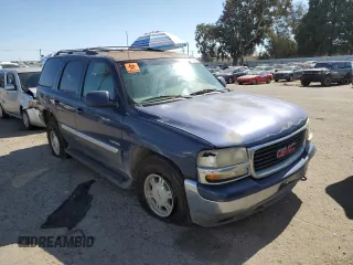 2001 GMC Yukon SLT z VIN 1GKEC13T21J264040, wystawiony jako Copart lot #46282145 z przebiegiem 136 264 mil mil oraz Szkoda całkowita • Salvage title. Historia ofert i sprzedaży dostępna na DreamBid. Obrazek 4.