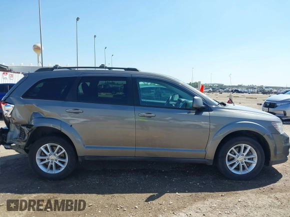 2013 Dodge Journey SXT with VIN 3C4PDDBGXDT650886, listed as a IAAI auction lot 41864331 with 224,579 mi miles and . Bid and sale history available at DreamBid. Image 13.