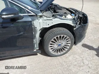 2015 Ford Fusion Titanium with VIN 3FA6P0K99FR268450, listed as a IAAI auction lot 41805513 with 202,009 mi miles. Bid and sale history available at carsss.com. Image 6.