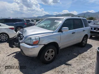 2005 Honda Pilot EX-L z VIN 5FNYF18555B060419, wystawiony jako Copart lot #58380155 z przebiegiem Nie podano mil oraz Szkoda całkowita • Salvage title. Historia ofert i sprzedaży dostępna na DreamBid. Obrazek 1.