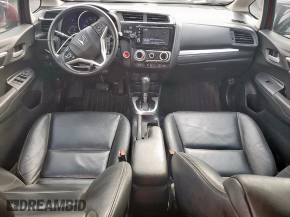 2018 Honda Fit EX-L with VIN 3HGGK5H97JM706911, listed as a Copart auction lot 57121595 with 117,375 mi miles and Salvage title. Bid and sale history available at DreamBid. Image 8.