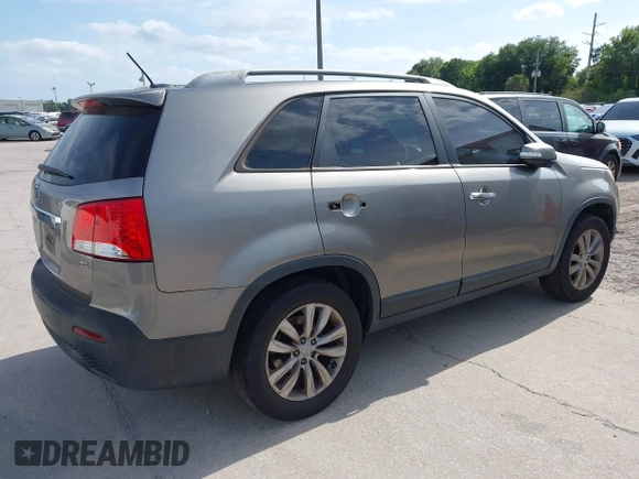 2011 Kia Sorento EX with VIN 5XYKU4A10BG113603, listed as a IAAI auction lot 42123052 with 238,437 mi miles. Bid and sale history available at carsss.com. Image 4.