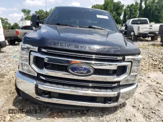 2020 Ford F-250 XL with VIN 1FT8W2BTXLEE30615, listed as a Copart auction lot 60626295 with 142,318 mi miles and Salvage title. Bid and sale history available at DreamBid. Image 5.