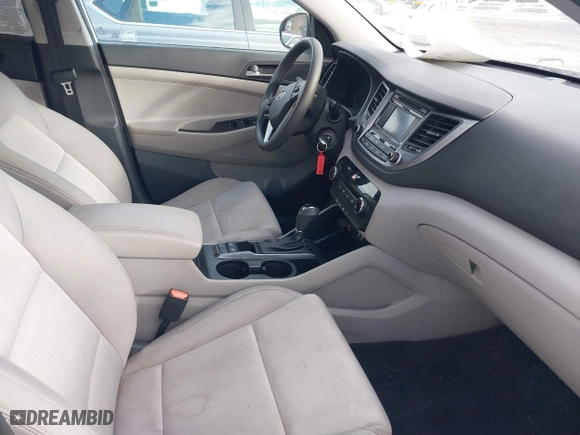 2016 Hyundai Tucson SE with VIN KM8J3CA44GU254260, listed as a IAAI auction lot 41328567 with 124,554 mi miles. Bid and sale history available at carsss.com. Image 5.