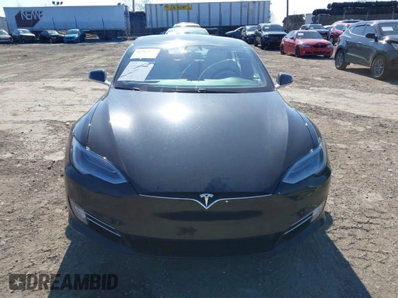 2020 Tesla Model S Long Range with VIN 5YJSA1E23LF381872, listed as a IAAI auction lot 41763046 with 96,720 mi miles and . Bid and sale history available at DreamBid. Image 13.