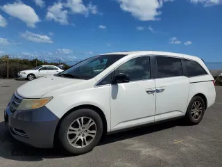2012 Honda Odyssey EX-L with VIN 5FNRL5H69CB051748, listed as a Copart auction lot 46780975 with 170,289 mi miles and Salvage Title. Bid and sale history available at carsss.com. Image 1.