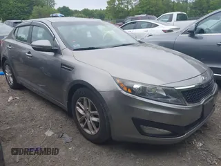 2013 Kia Optima LX z VIN 5XXGM4A76DG175685, wystawiony jako IAAI lot #42310572 z przebiegiem 118 201 mil mil oraz . Historia ofert i sprzedaży dostępna na DreamBid. Obrazek 1.