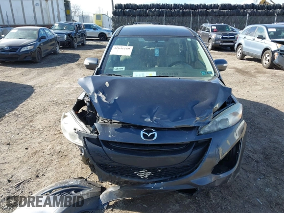 2013 Mazda 5 Sport z VIN JM1CW2BL3D0155694, wystawiony jako IAAI lot #41641169 z przebiegiem Nie podano mil oraz . Historia ofert i sprzedaży dostępna na DreamBid. Obrazek 11.