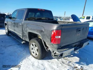 2015 GMC Sierra 1500 SLT with VIN 3GTU2VEC9FG251308, listed as a IAAI auction lot 41794226 with 127,391 mi miles. Bid and sale history available at carsss.com. Image 3.