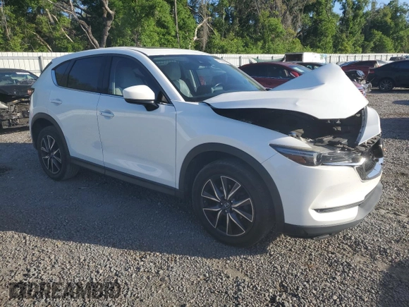 2017 Mazda CX-5 Grand Touring with VIN JM3KFADL1H0141132, listed as a Copart auction lot 51755095 with 116,220 mi miles and Salvage Title. Bid and sale history available at carsss.com. Image 4.