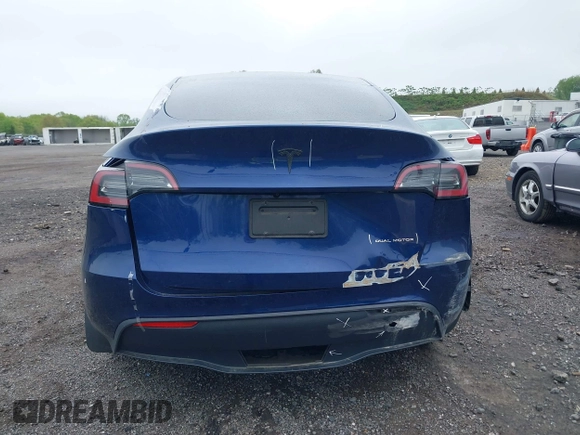 2023 Tesla Model Y Long Range z VIN 7SAYGDEE6PF603981, wystawiony jako IAAI lot #42133348 z przebiegiem 28 566 mil mil oraz . Historia ofert i sprzedaży dostępna na DreamBid. Obrazek 17.