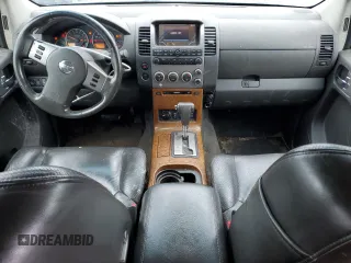 2006 Nissan Pathfinder SE z VIN 5N1AR18W66C610092, wystawiony jako Copart lot #60208105 z przebiegiem 235 876 mil mil oraz Czysty tytuł • Clean title. Historia ofert i sprzedaży dostępna na DreamBid. Obrazek 8.