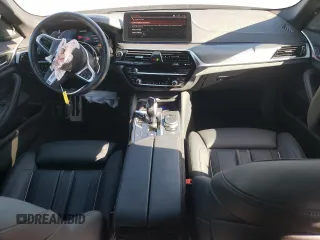 2023 BMW 5 Series M550i xDrive with VIN WBA13BK03PCM44838, listed as a Copart auction lot 68434874 with 17,798 mi miles and Salvage title. Bid and sale history available at DreamBid. Image 8.