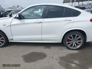 2017 BMW X4 M40i with VIN 5UXXW7C59H0M91384, listed as a IAAI auction lot 41883585 with 163,547 mi miles. Bid and sale history available at carsss.com. Image 15.