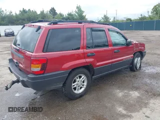 2003 Jeep Grand Cherokee Laredo with VIN 1J4GW48S73C611070, listed as a IAAI auction lot 42319030 with 177,771 mi miles and . Bid and sale history available at DreamBid. Image 4.