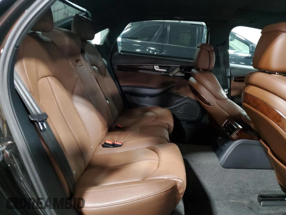 2011 Audi A8 z VIN WAURVAFD8BN005569, wystawiony jako Copart lot #52101065 z przebiegiem 104 893 mil mil oraz Szkody całkowita. Historia ofert i sprzedaży dostępna na DreamBid. Obrazek 10.