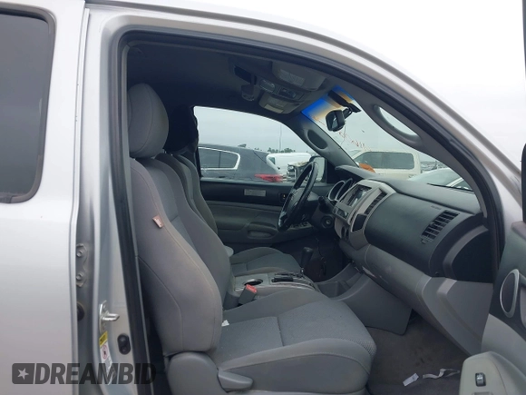 2009 Toyota Tacoma PreRunner with VIN 3TMJU62NX9M081748, listed as a IAAI auction lot 41608525 with 210,999 mi miles. Bid and sale history available at carsss.com. Image 5.