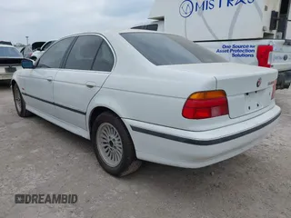 1997 BMW 5 Series 540i z VIN WBADE6327VBW50066, wystawiony jako IAAI lot #42149896 z przebiegiem 191 339 mil mil oraz . Historia ofert i sprzedaży dostępna na DreamBid. Obrazek 3.