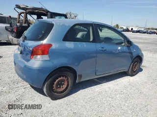 2011 Toyota Yaris with VIN JTDJT4K35B5330328, listed as a Copart auction lot 46904665 with 107,100 mi miles and Salvage Title. Bid and sale history available at carsss.com. Image 3.