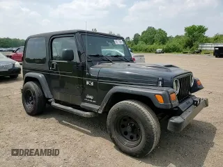 2005 Jeep Wrangler X z VIN 1J4FA39S75P321328, wystawiony jako Copart lot #59711505 z przebiegiem 126 768 mil mil oraz Szkoda całkowita • Salvage title. Historia ofert i sprzedaży dostępna na DreamBid. Obrazek 14.
