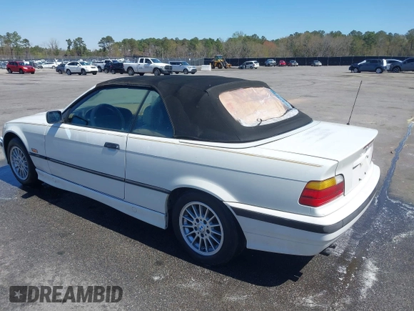 1996 BMW 3-Series 328IC with VIN WBABK8324TET92418, listed as a IAAI auction lot 41815664 with 128,661 mi miles. Bid and sale history available at carsss.com. Image 3.