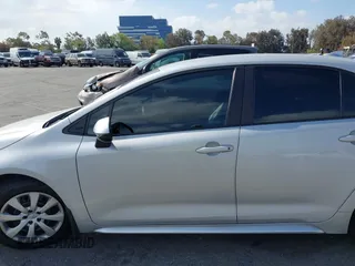 2023 Toyota Corolla LE with VIN 5YFB4MDEXPP042461, listed as a IAAI auction lot 41914637 with 66,651 mi miles. Bid and sale history available at carsss.com. Image 14.