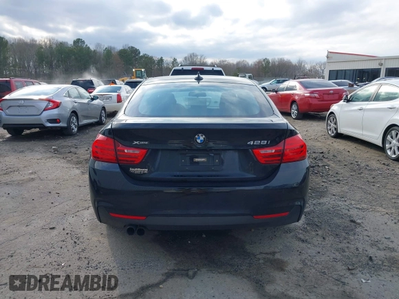 2016 BMW 4 Series 428i xDrive with VIN WBA4C9C52GG136584, listed as a IAAI auction lot 41530110 with 124,667 mi miles and . Bid and sale history available at carsss.com. Image 16.
