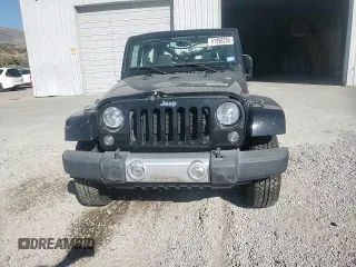 2015 Jeep Wrangler Sahara with VIN 1C4AJWBG5FL733795, listed as a Copart auction lot 61998255 with 86,655 mi miles and Salvage title. Bid and sale history available at DreamBid. Image 13.