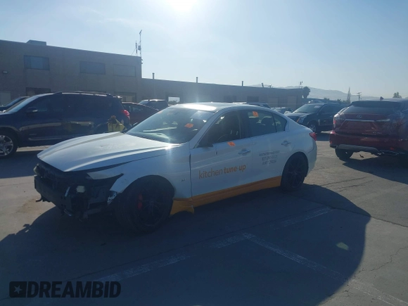 2014 Infiniti Q50 Premium with VIN JN1BV7AP8EM674009, listed as a IAAI auction lot 42598117 with 158,411 mi miles and . Bid and sale history available at DreamBid. Image 21.