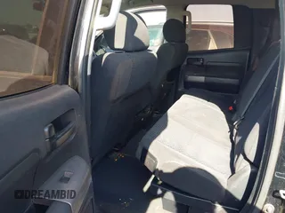 2013 Toyota Tundra z VIN 5TFRM5F19DX063197, wystawiony jako IAAI lot #41799886 z przebiegiem 351 859 mil mil oraz . Historia ofert i sprzedaży dostępna na DreamBid. Obrazek 8.