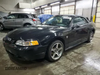 1999 Ford Mustang GT z VIN 1FAFP45X7XF143026, wystawiony jako Copart lot #80798284 z przebiegiem Nie podano mil oraz Szkoda całkowita • Salvage title. Historia ofert i sprzedaży dostępna na DreamBid. Obrazek 1.